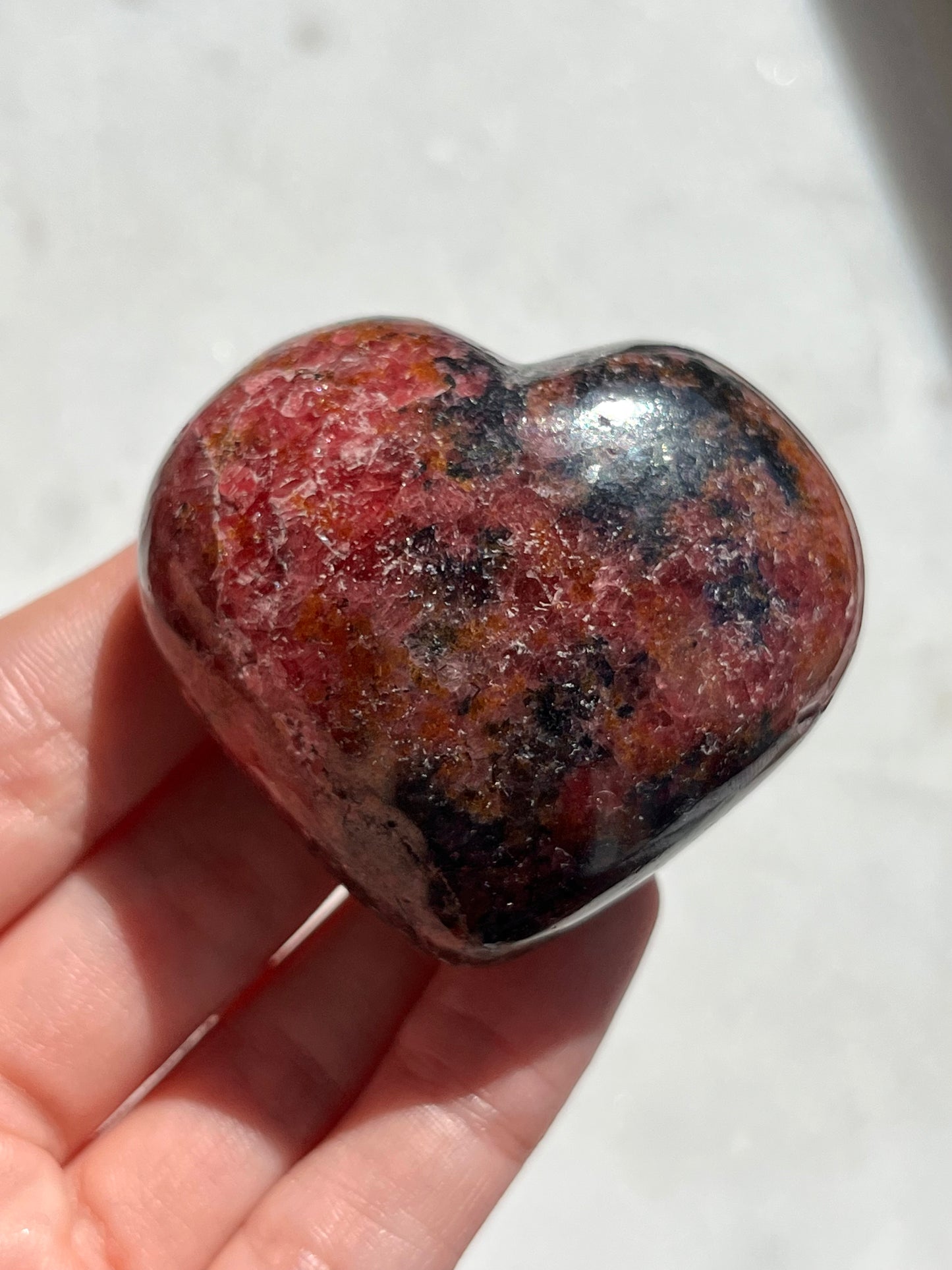 Madagascan Rhodonite Heart Palmstone