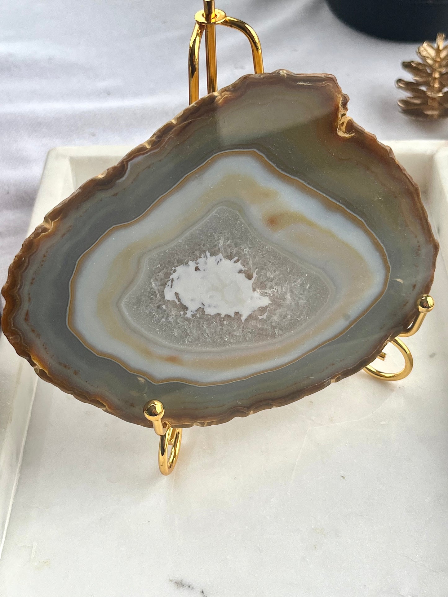 Soporte de losa dorada