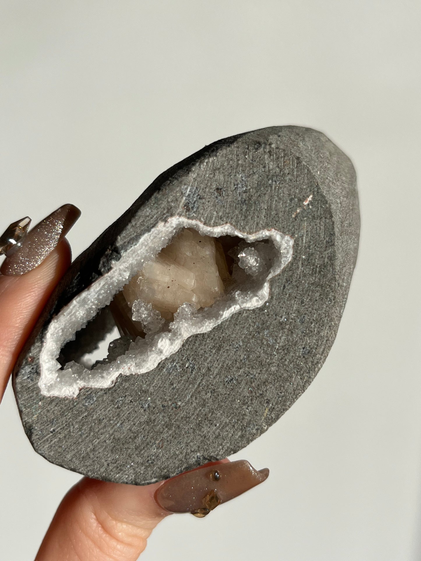 Stalactitic Apophyllite with Peach Stilbite Geode Cave in Basalt Z