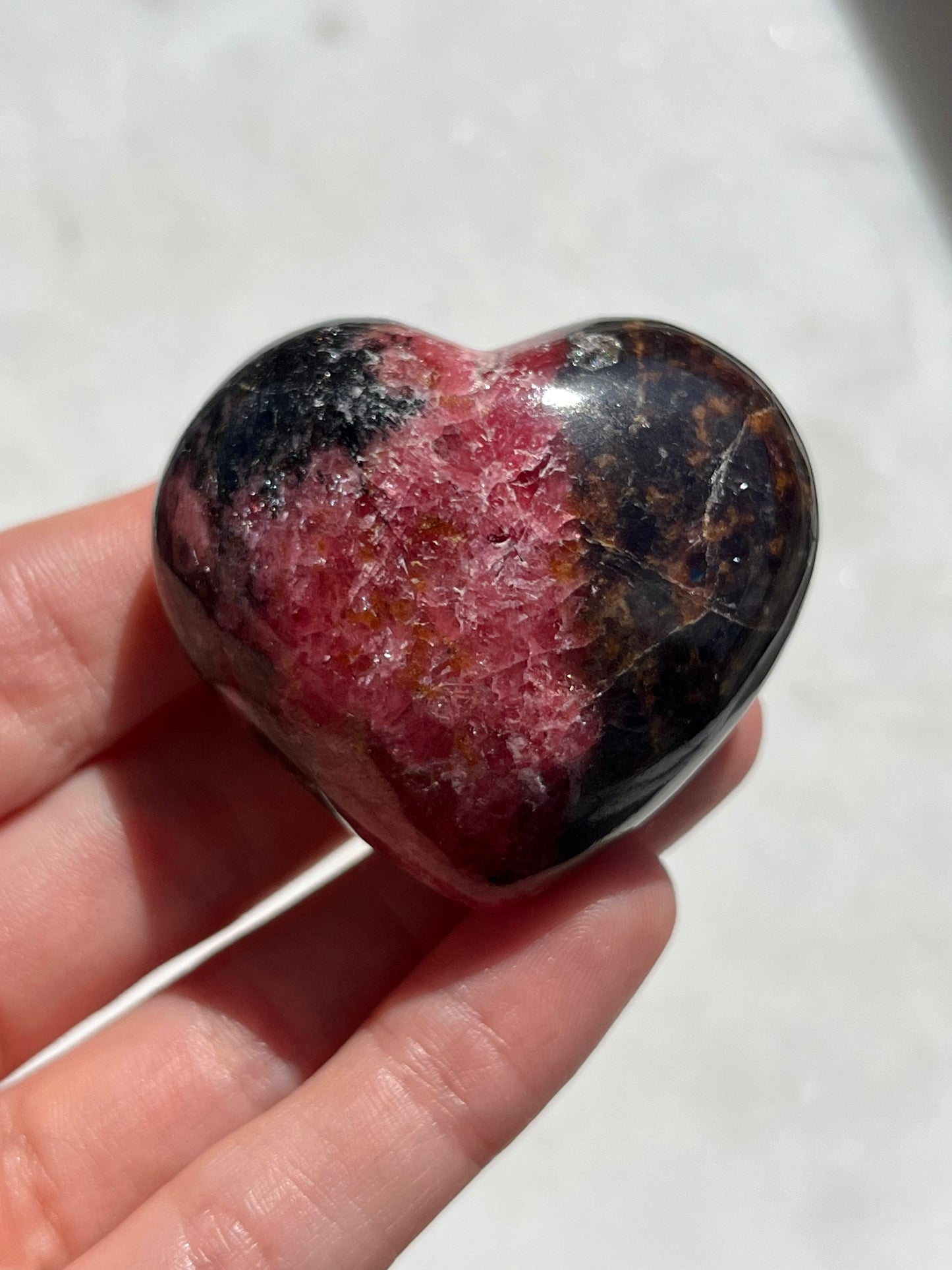 Madagascan Rhodonite Heart Palmstone