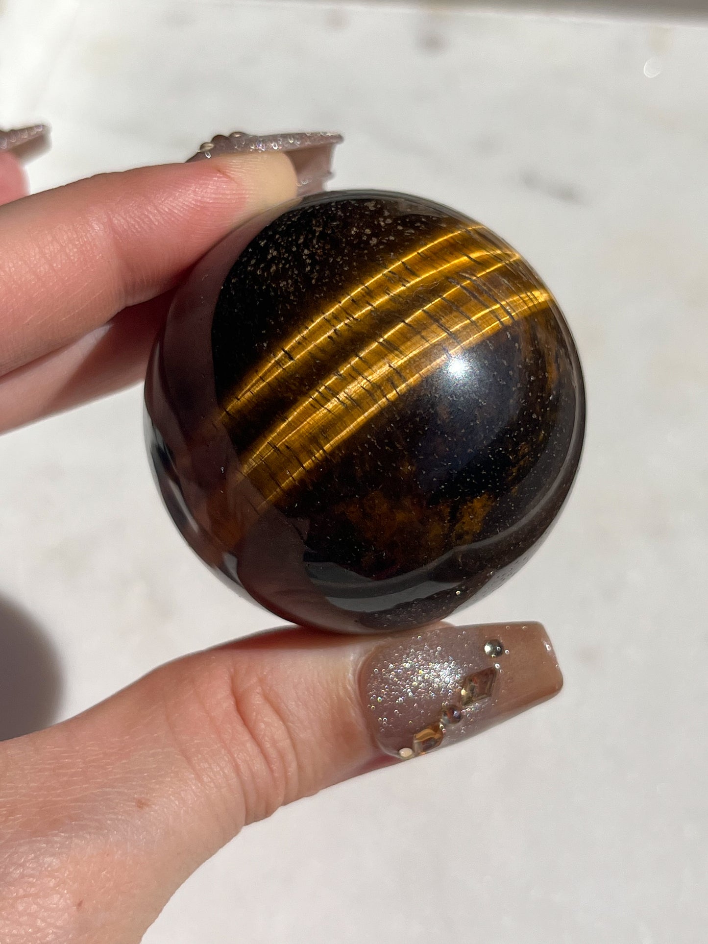 Esfera de ojo de tigre dorado (elegida intuitivamente)