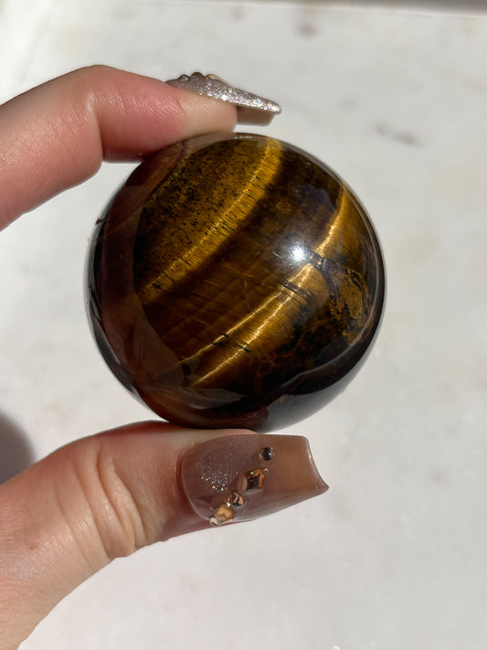 Esfera de ojo de tigre dorado (elegida intuitivamente)