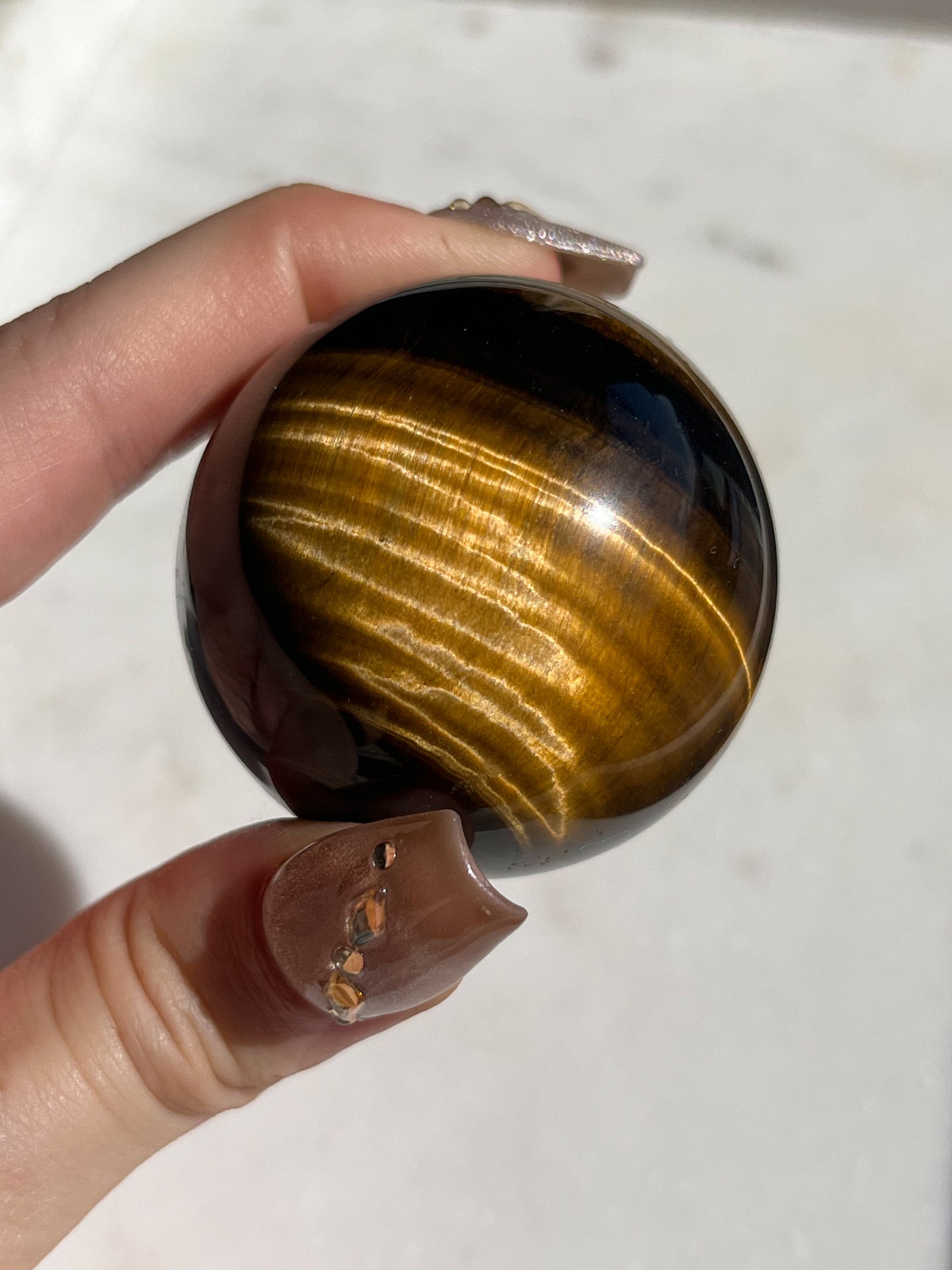 Esfera de ojo de tigre dorado (elegida intuitivamente)
