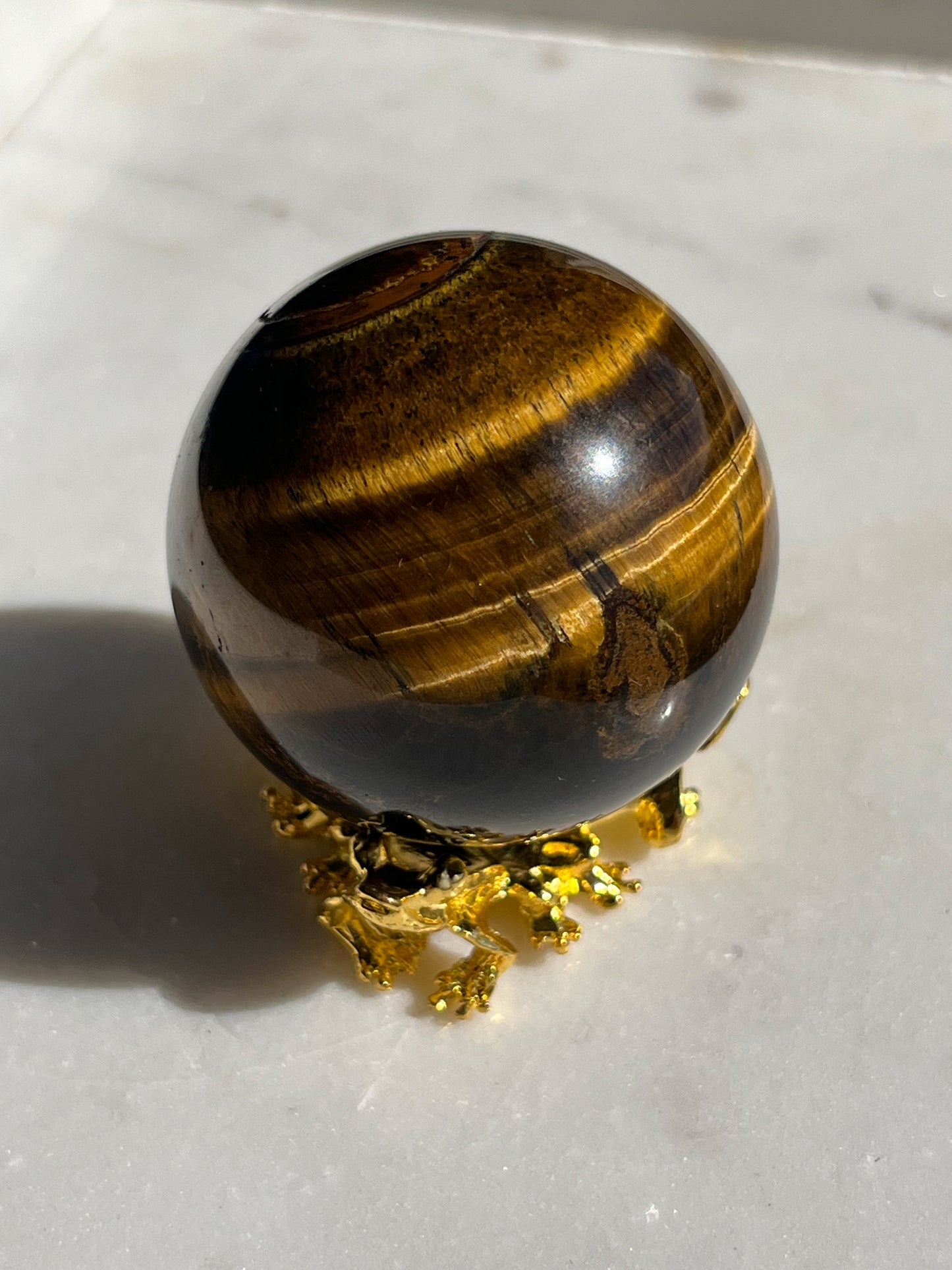 Esfera de ojo de tigre dorado (elegida intuitivamente)