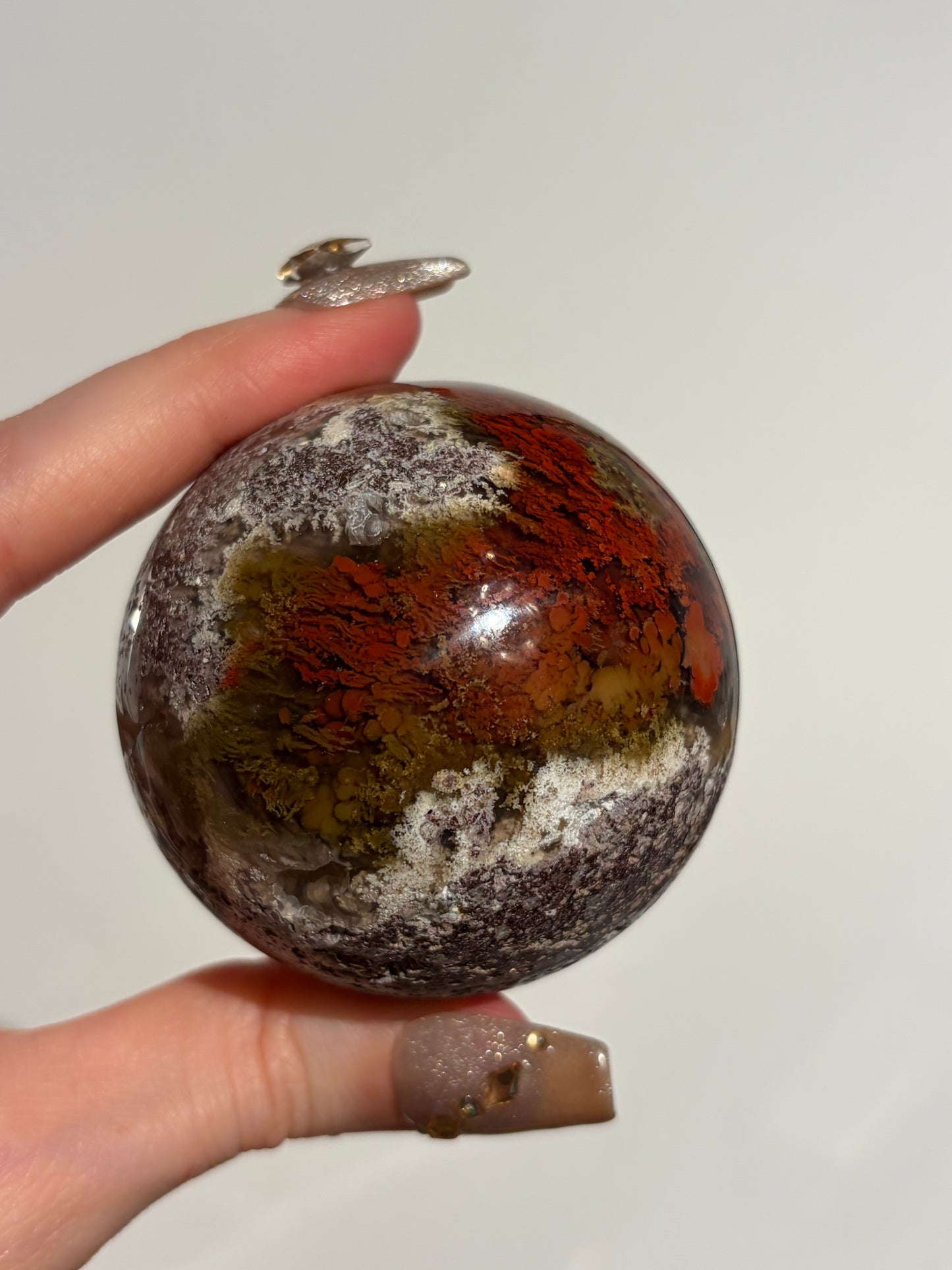 “Crimson Veils” Nebula Agate Sphere with Red Moss B