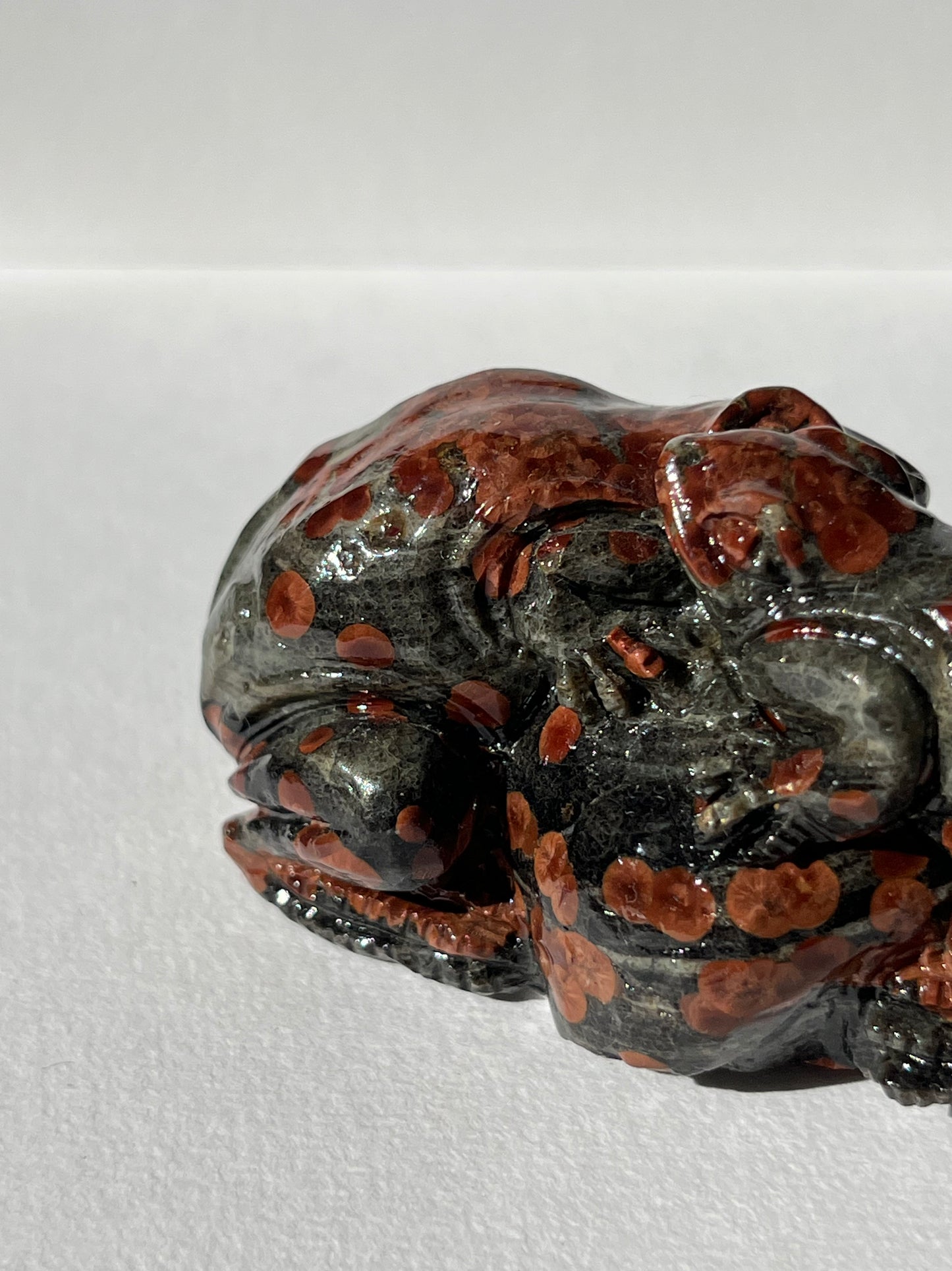 “Embrace” Peanut Obsidian Frog Carving