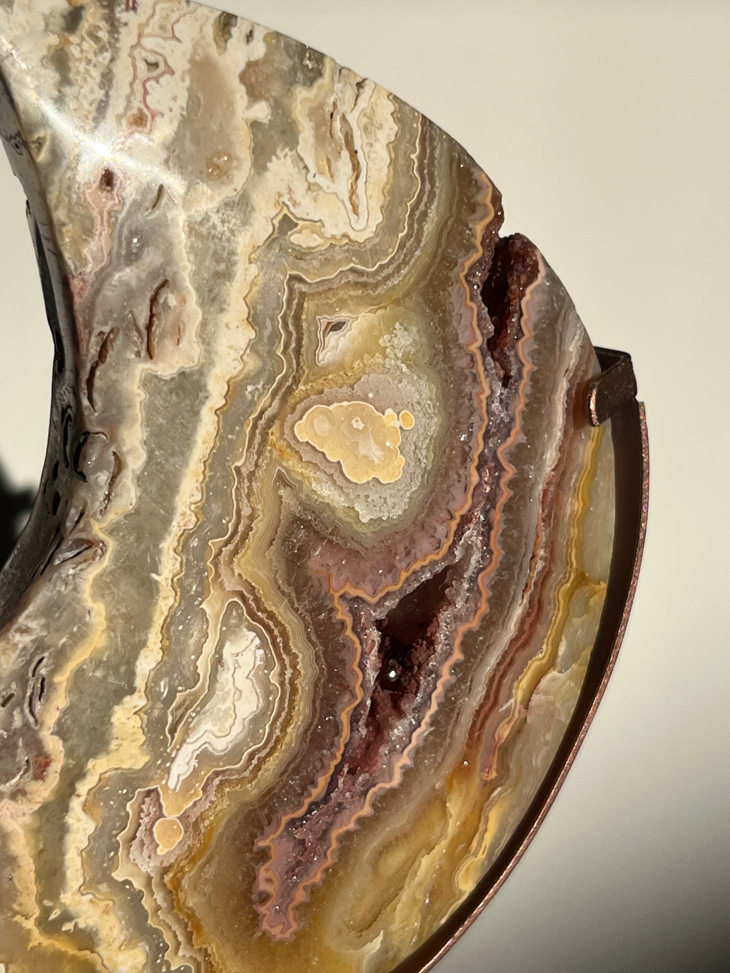 Golden Lace Agate Moon Carving on Rose Gold Coloured Stand A