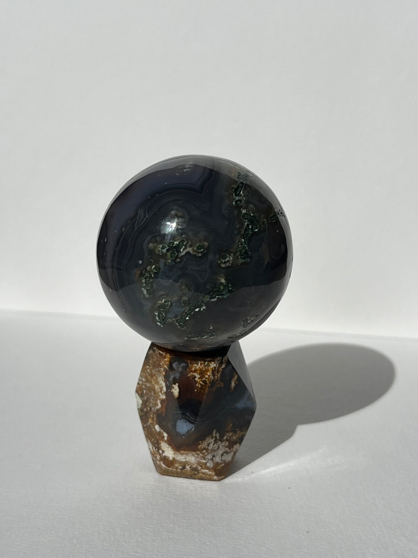 East Indonesian Agate with Green Moss Sphere on Geometric Faceted Crystal Stand B