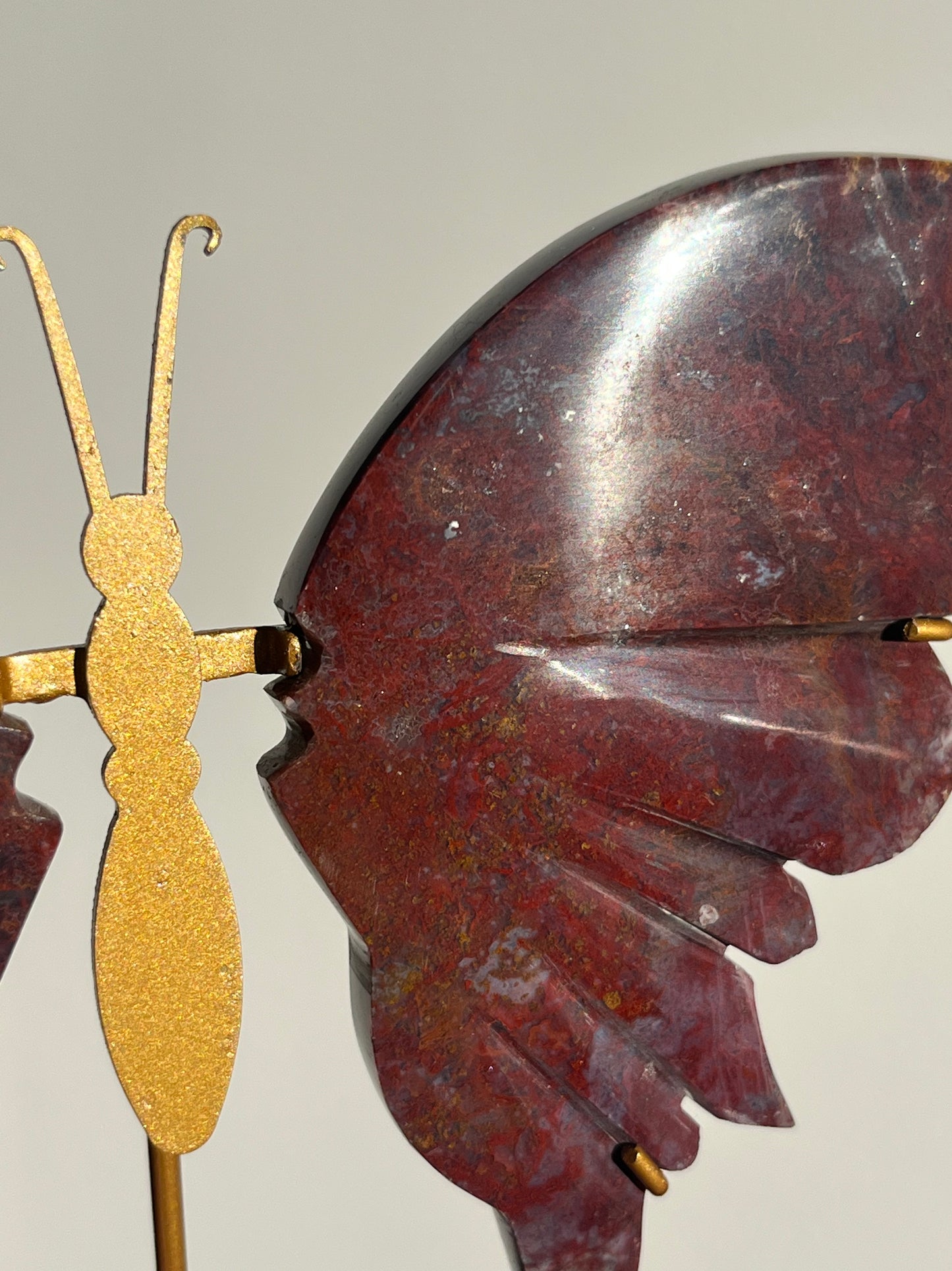 Red Moss in Chalcedony Butterfly Wing set on Stand