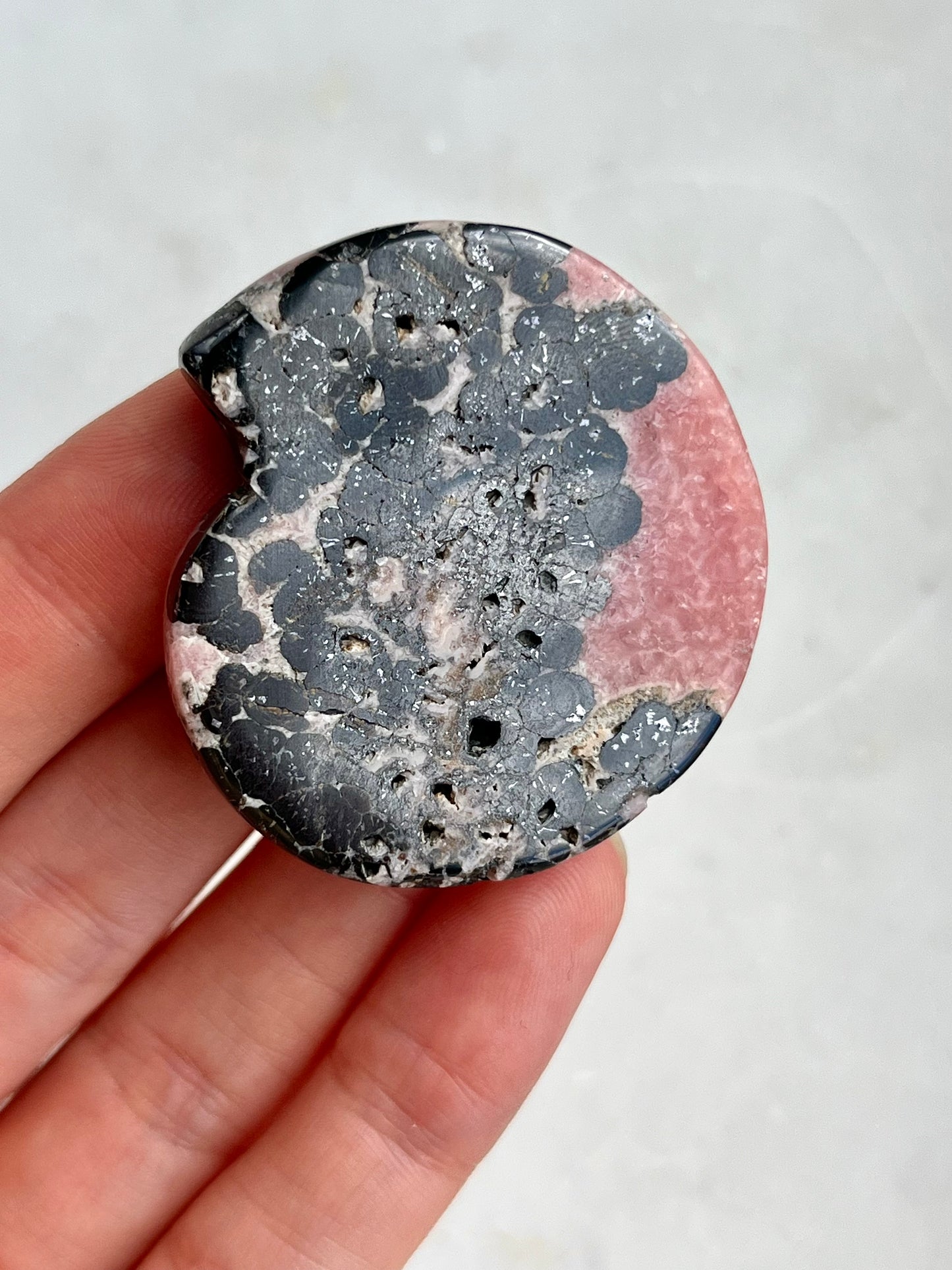 “Imperial” Rhodochrosite Ammonite Carving w/Manganese Ore Flower Pattern