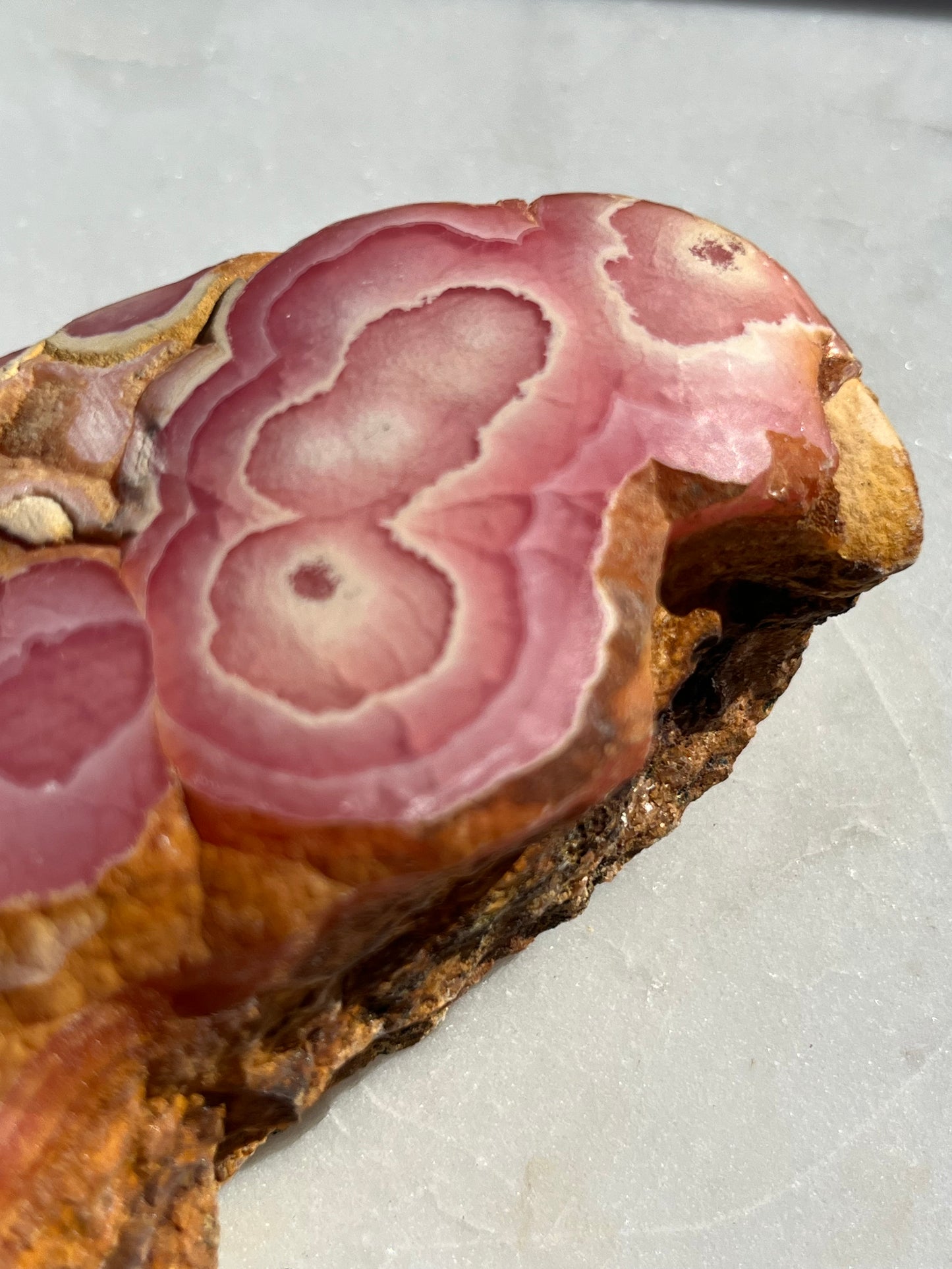 ‘Titania’ Rhodochrosite Freeform with Iron Included Matrix #8