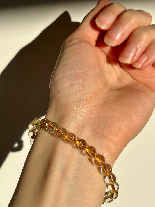 Golden Rutile in Quartz 8mm Bead Bracelet