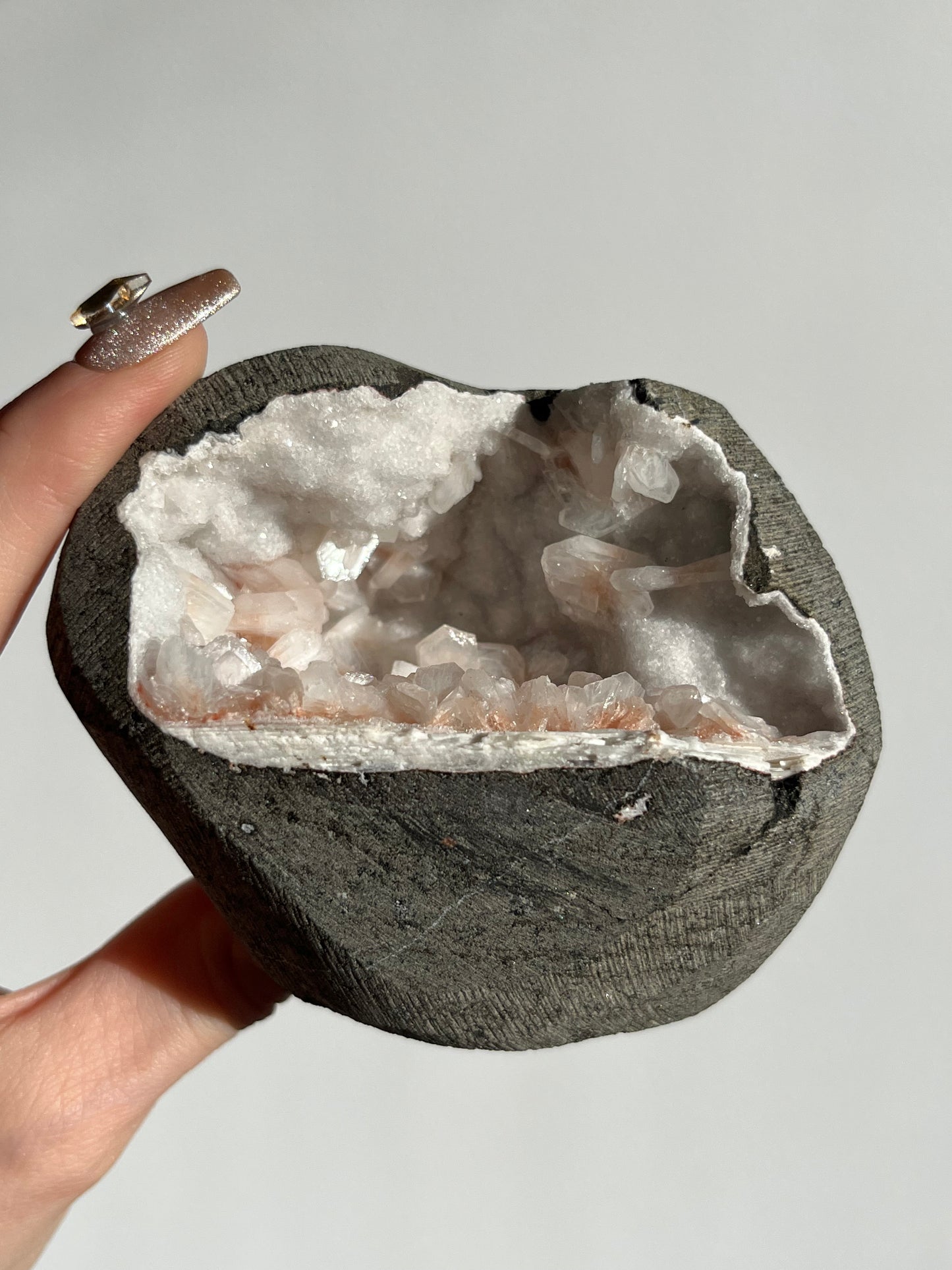 Peach Stilbite & Chalcedony Geode Cave in Basalt G