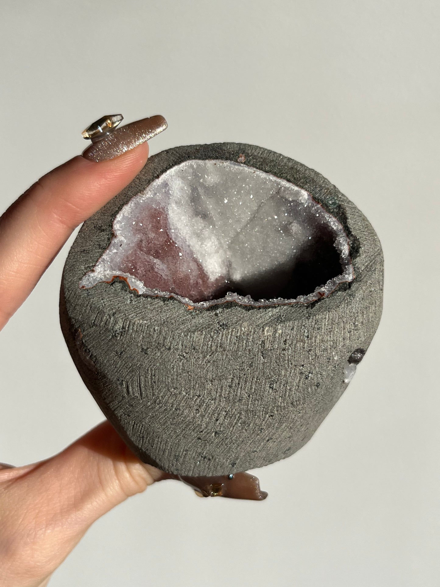 Pink and White Chalcedony Geode Cave in Basalt Y