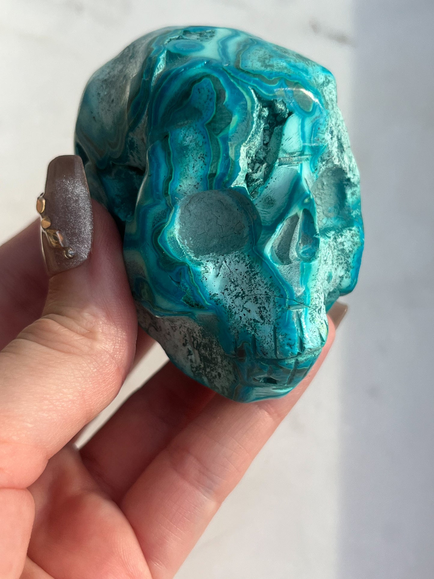 Orbicular Chrysocolla Skull Carving