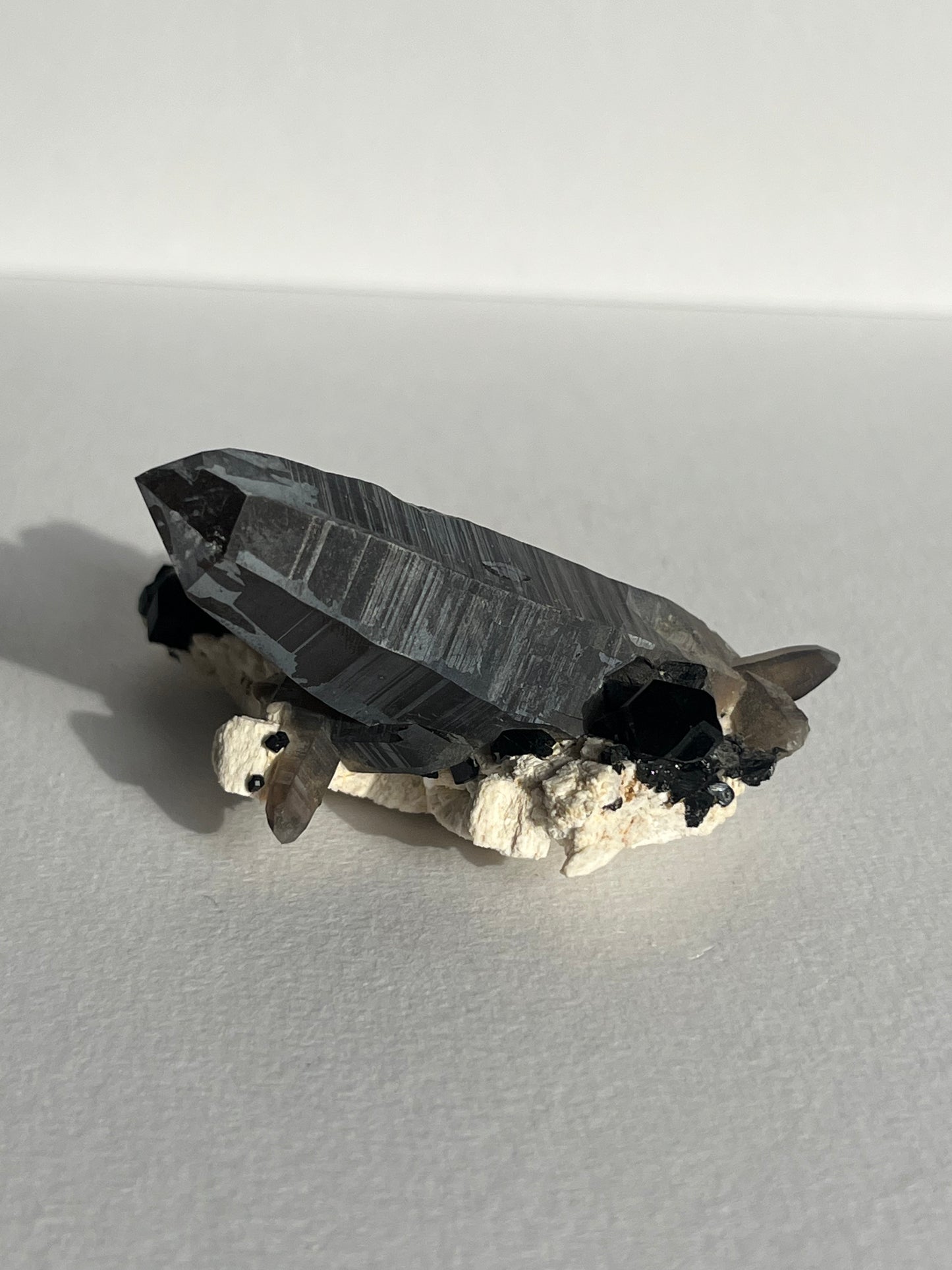 Natural Iridescent Smokey Quartz with Schorl Tourmaline on Feldspar Specimen A