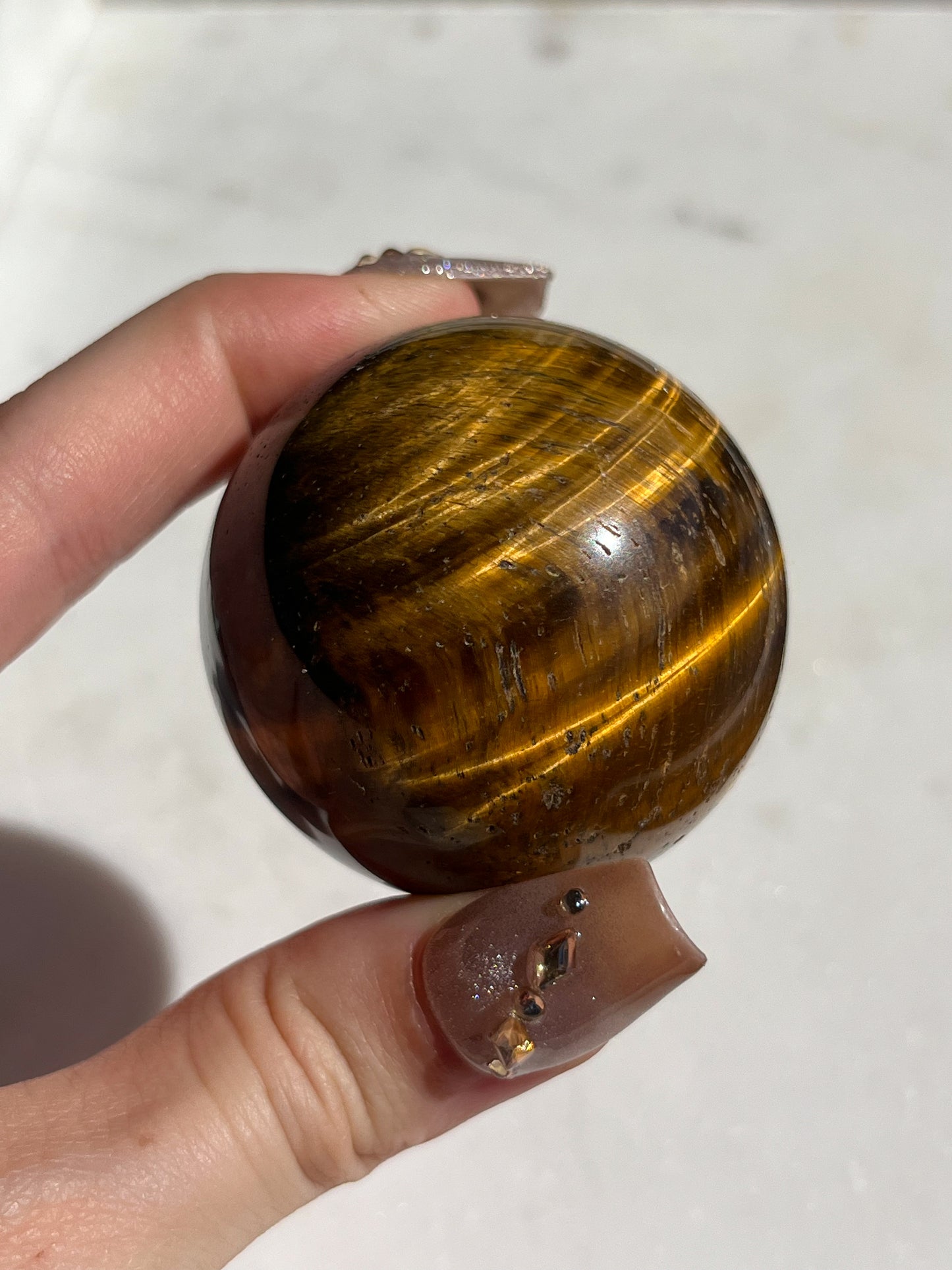 Esfera de ojo de tigre dorado (elegida intuitivamente)