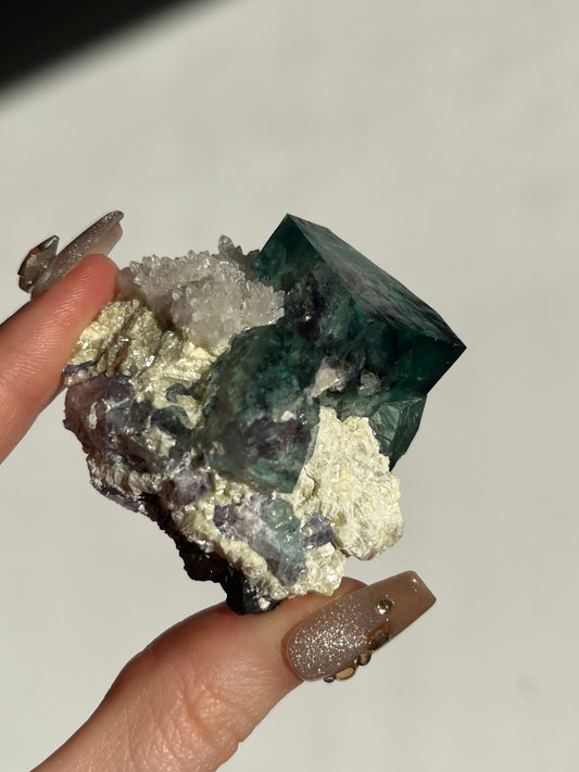 Vibrant Green-Purple Phantom Yindu Fluorite Specimen with Quartz E