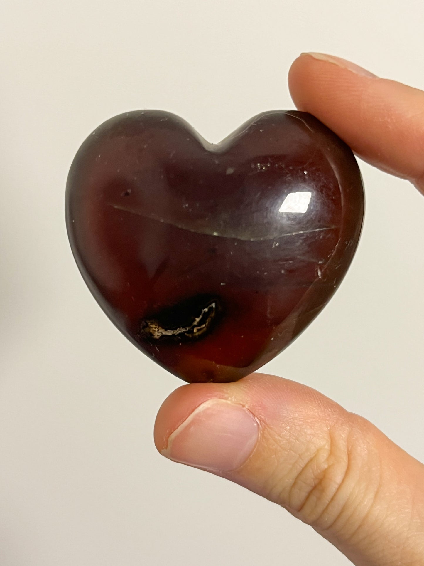 Indonesian Sumatran Amber Heart Palmstone #2