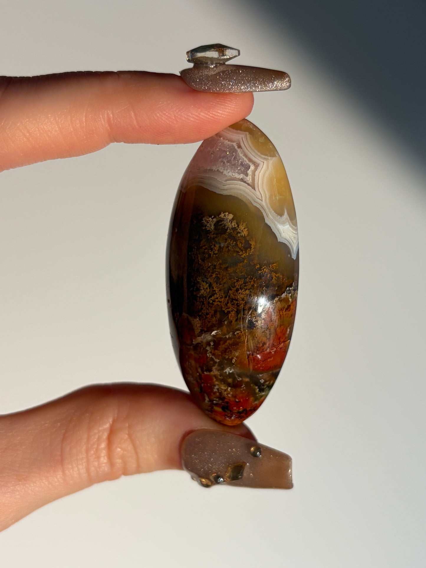 Nebula Agate with Amethyst and Red Moss Inclusions Shiva J (Parallax Effect)