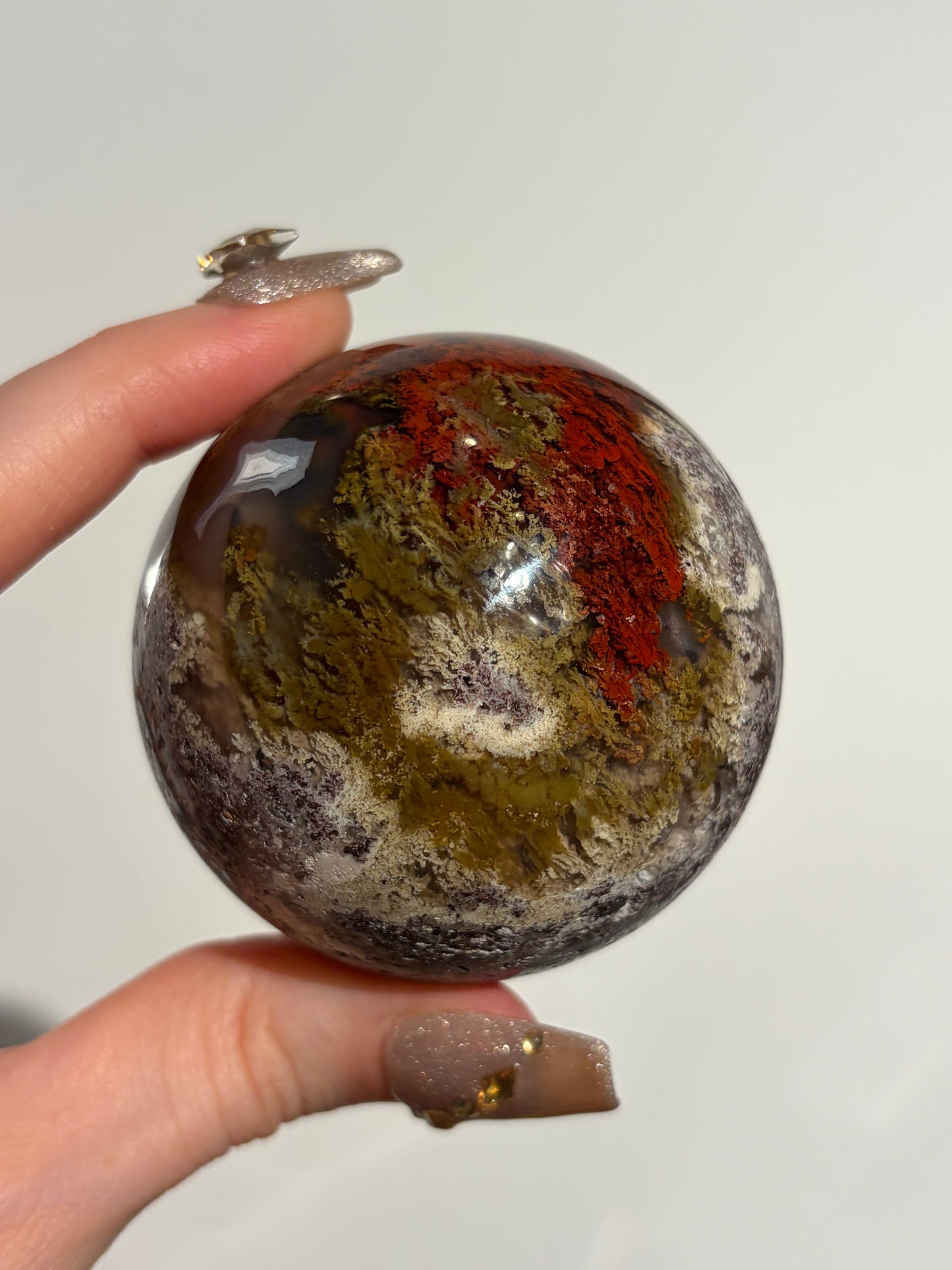 “Crimson Veils” Nebula Agate Sphere with Red Moss B