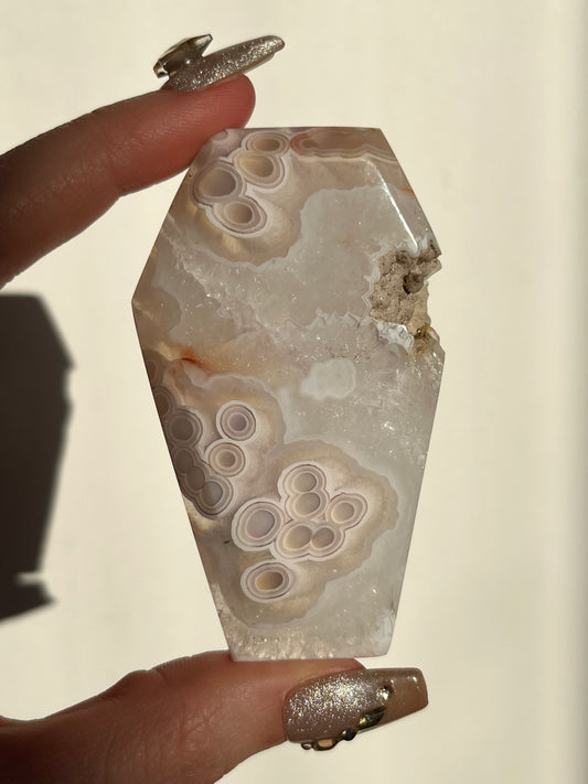 Orbicular Nebula Agate Coffin Carving