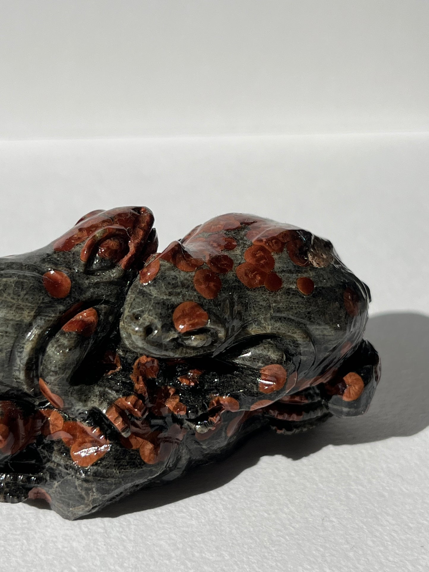 “Embrace” Peanut Obsidian Frog Carving