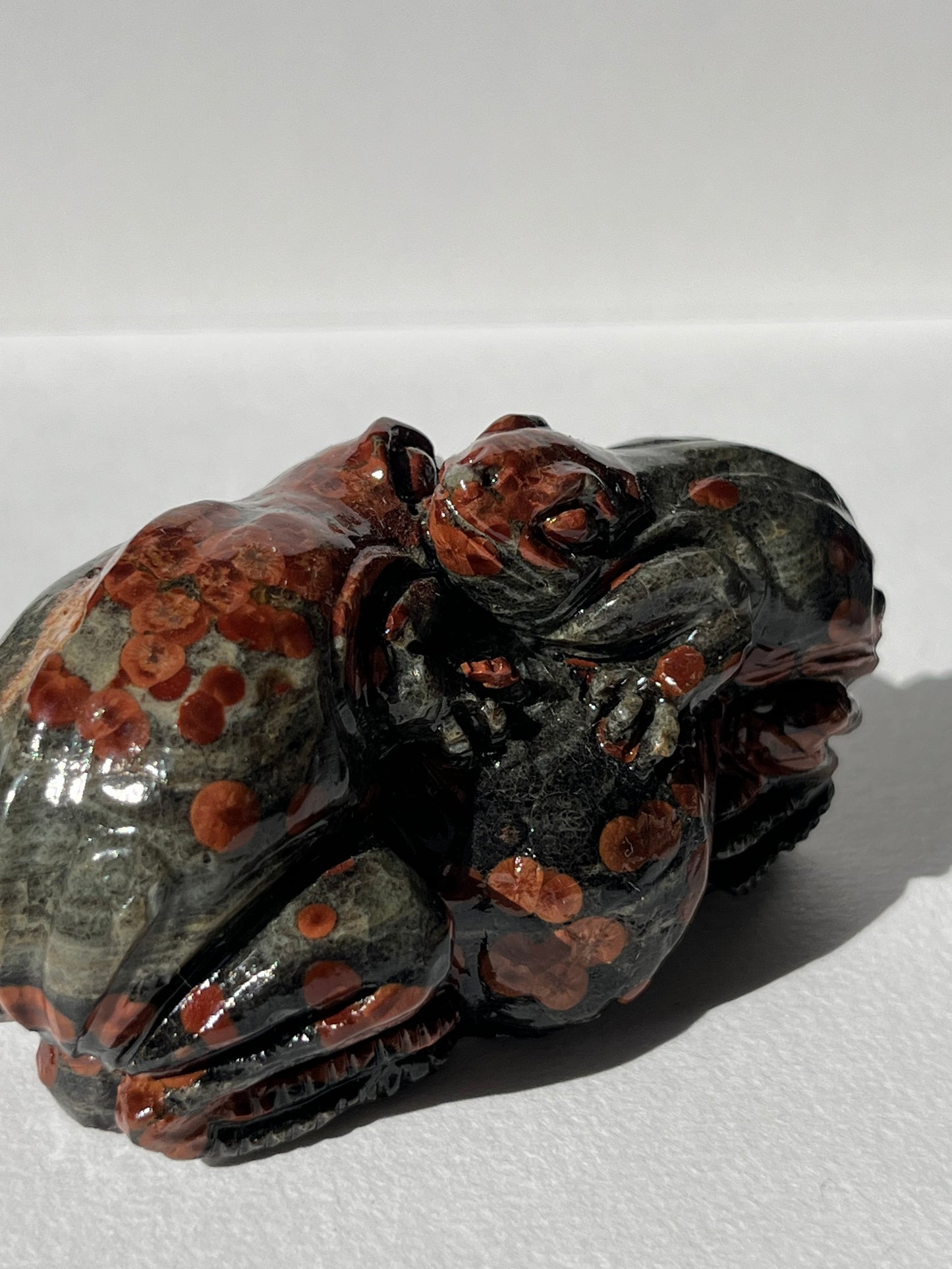 “Embrace” Peanut Obsidian Frog Carving
