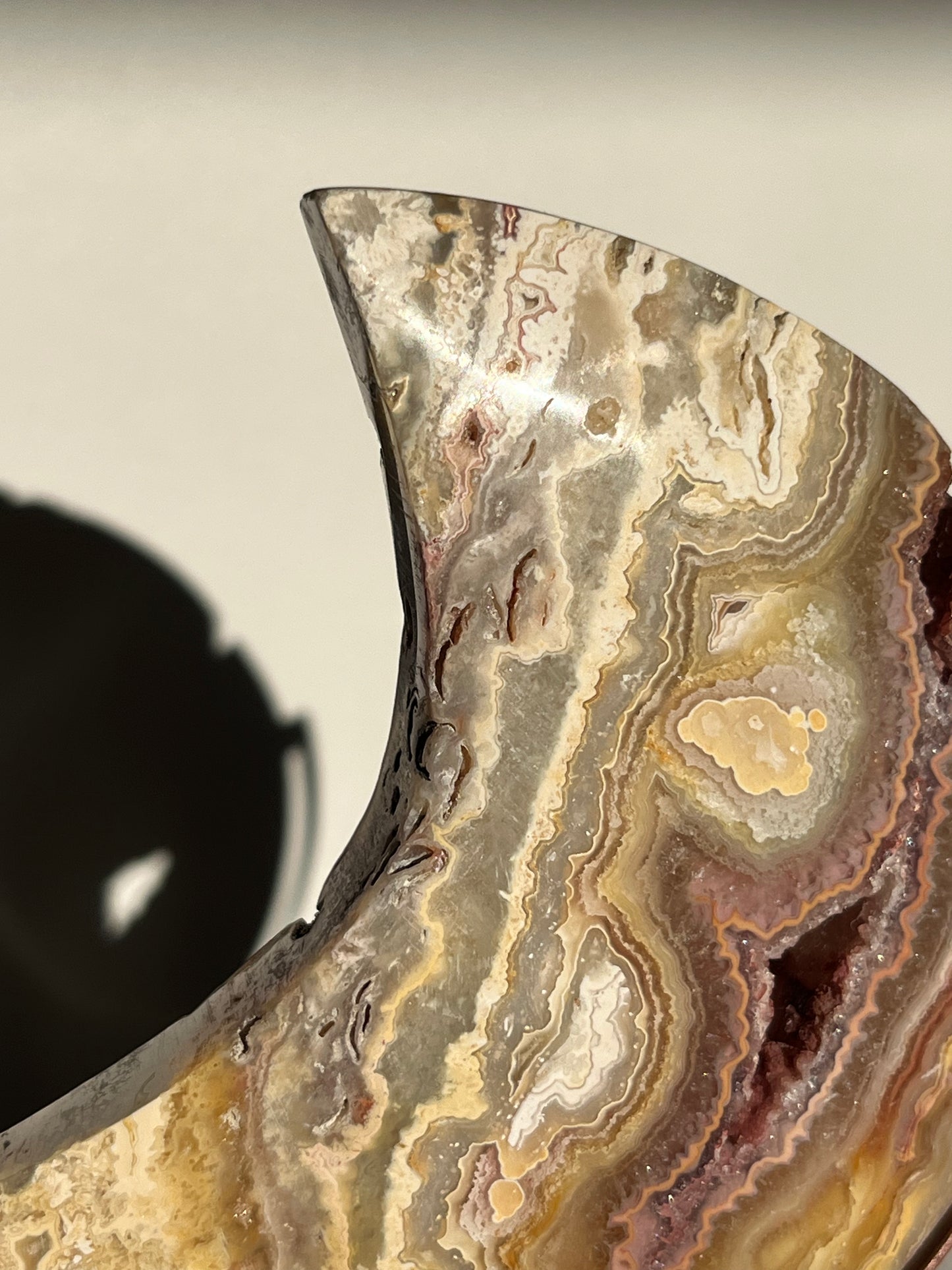 Golden Lace Agate Moon Carving on Rose Gold Coloured Stand A