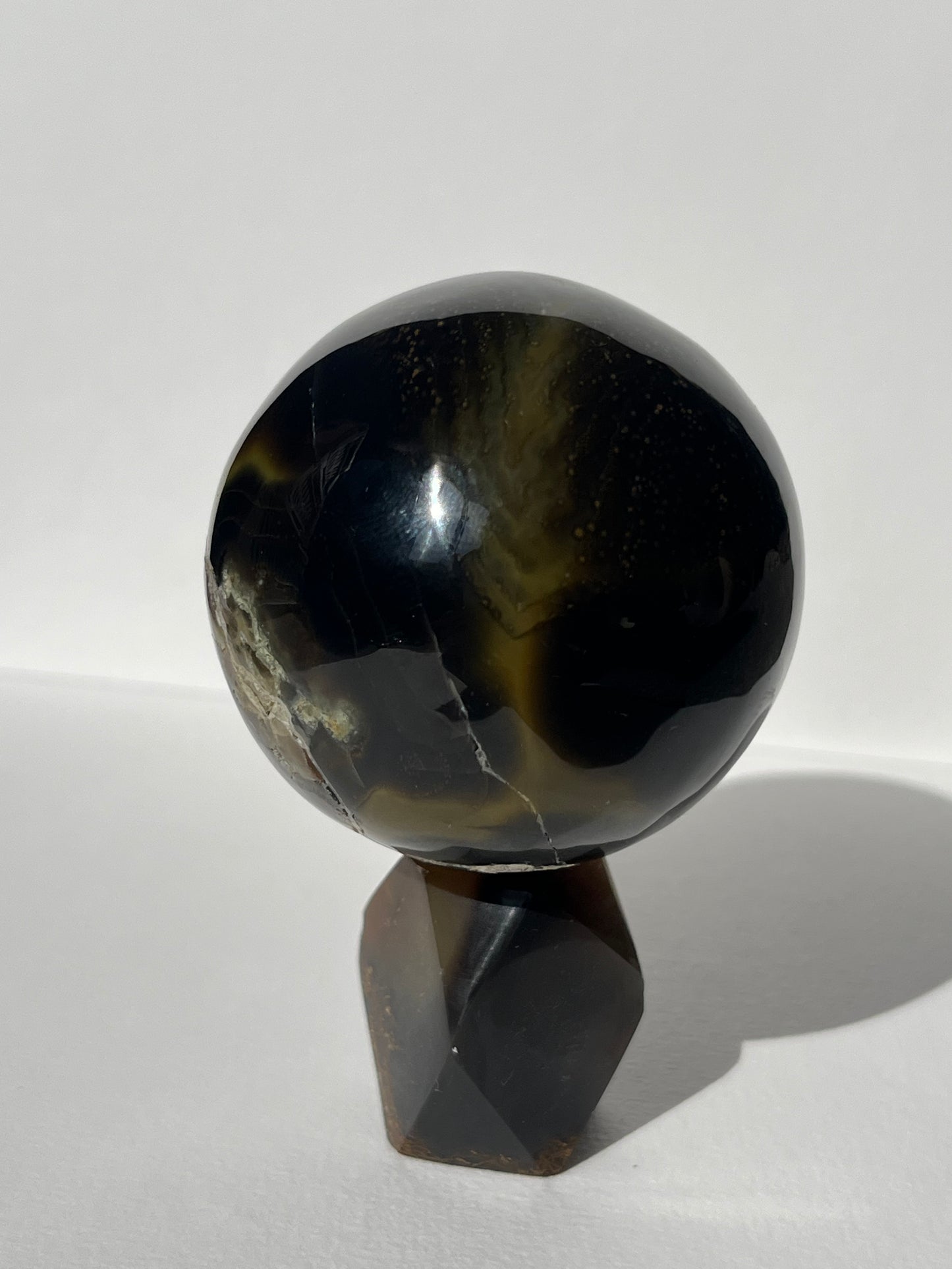 Purple Banded Agate Sphere on Geometric Faceted Crystal Stand A