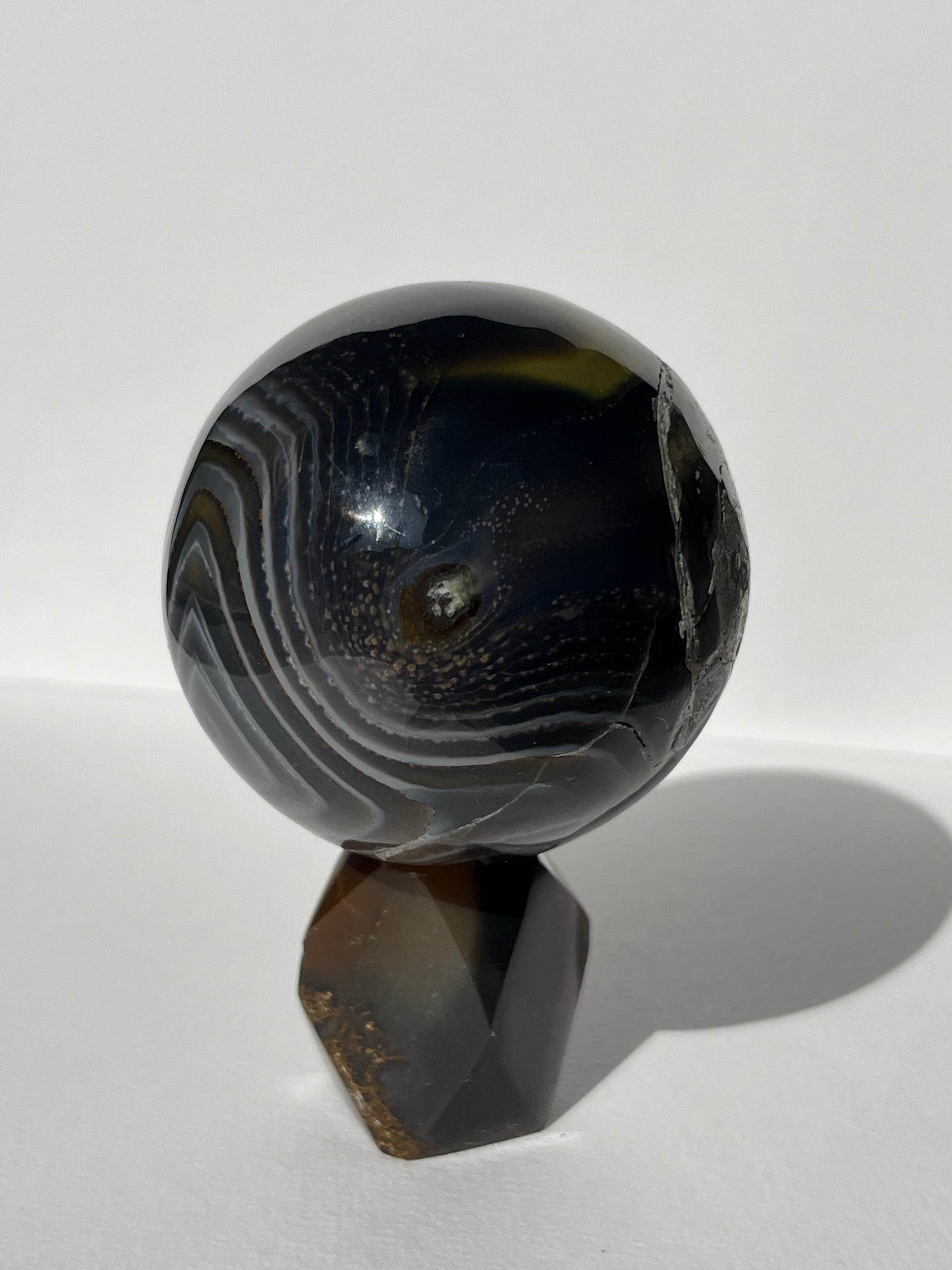 Purple Banded Agate Sphere on Geometric Faceted Crystal Stand A