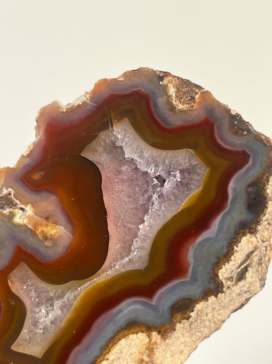 ‘Aurora Sanctum’ Orange-Red Laguna Agate with Amethyst Geode