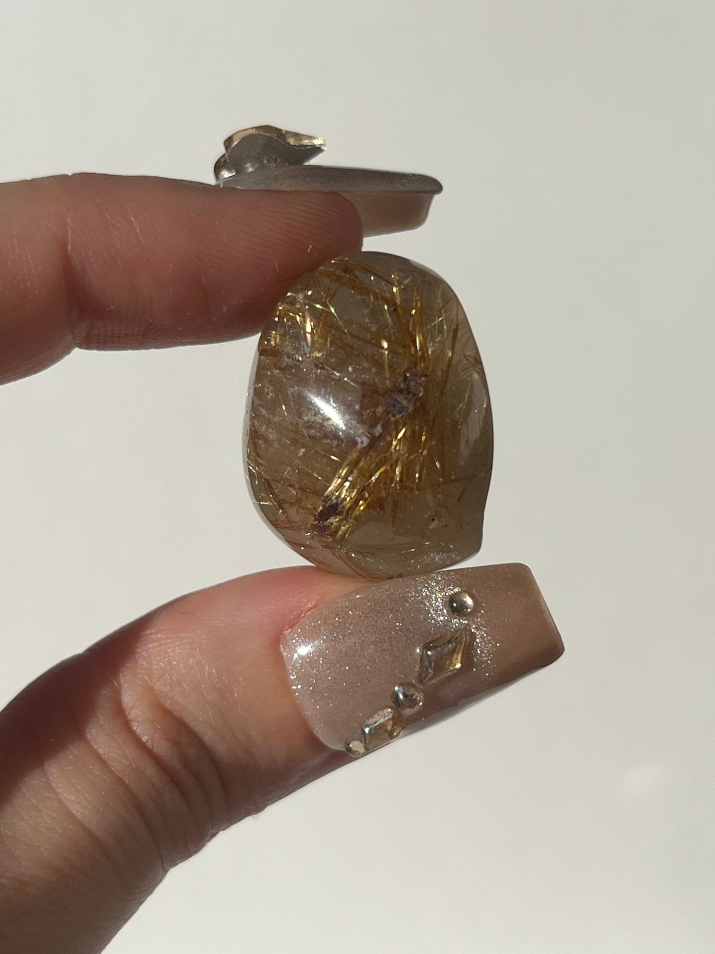 Rutilated Quartz Lens Carving A