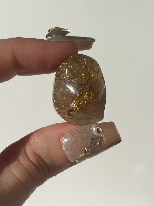 Rutilated Quartz Lens Carving A