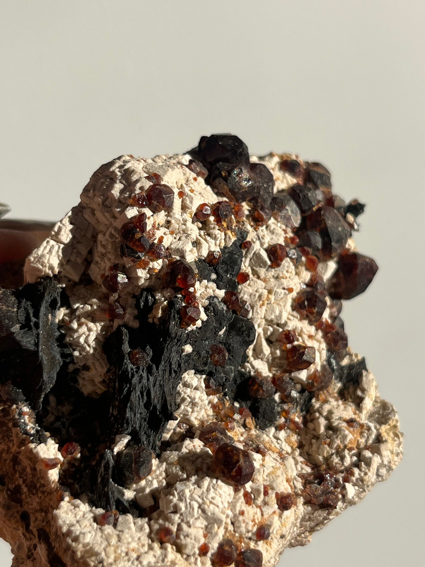 Spessartine Garnet with Metallic Inclusions and Feldspar Specimen B