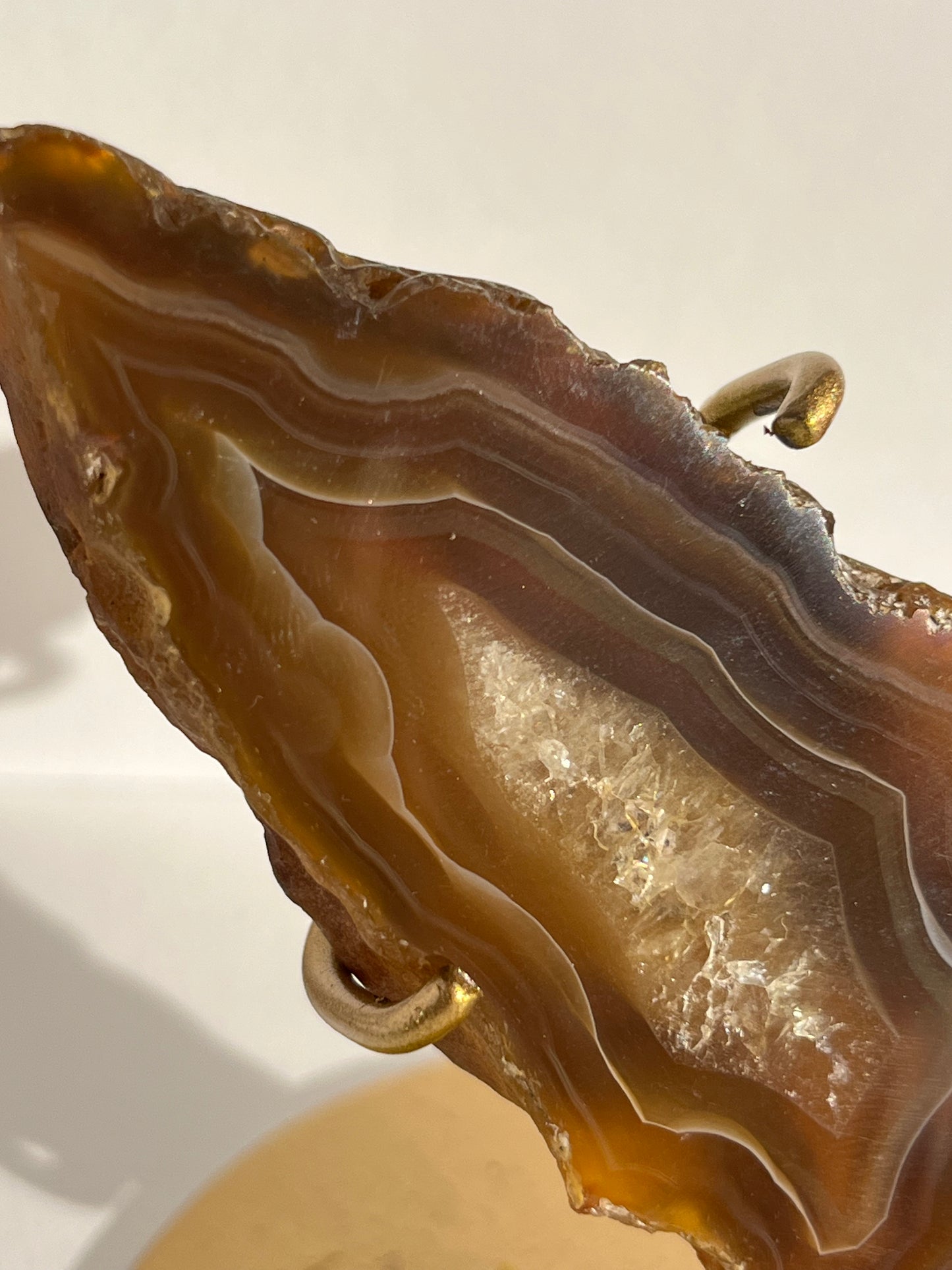 “Plasma Waves” Banded Coffee Agate with Quartz Wing Set on Stand